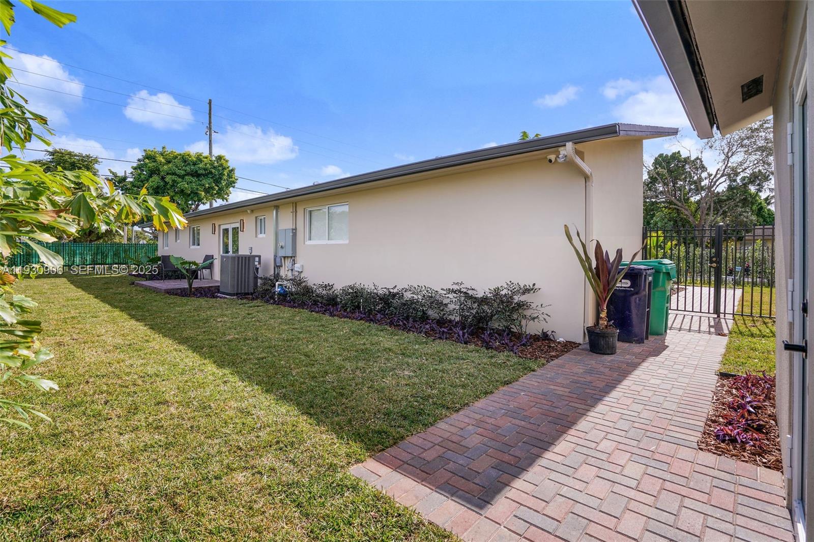 6701 Southwest 49th Terrace Miami, FL 33155 - Photo 22 of 35 a house view with a garden space