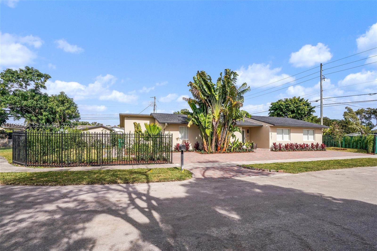 6701 Southwest 49th Terrace Miami, FL 33155 - Photo 3 of 35 a view of a volley ball court
