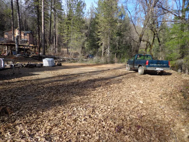 a backyard of a house with lots of green space