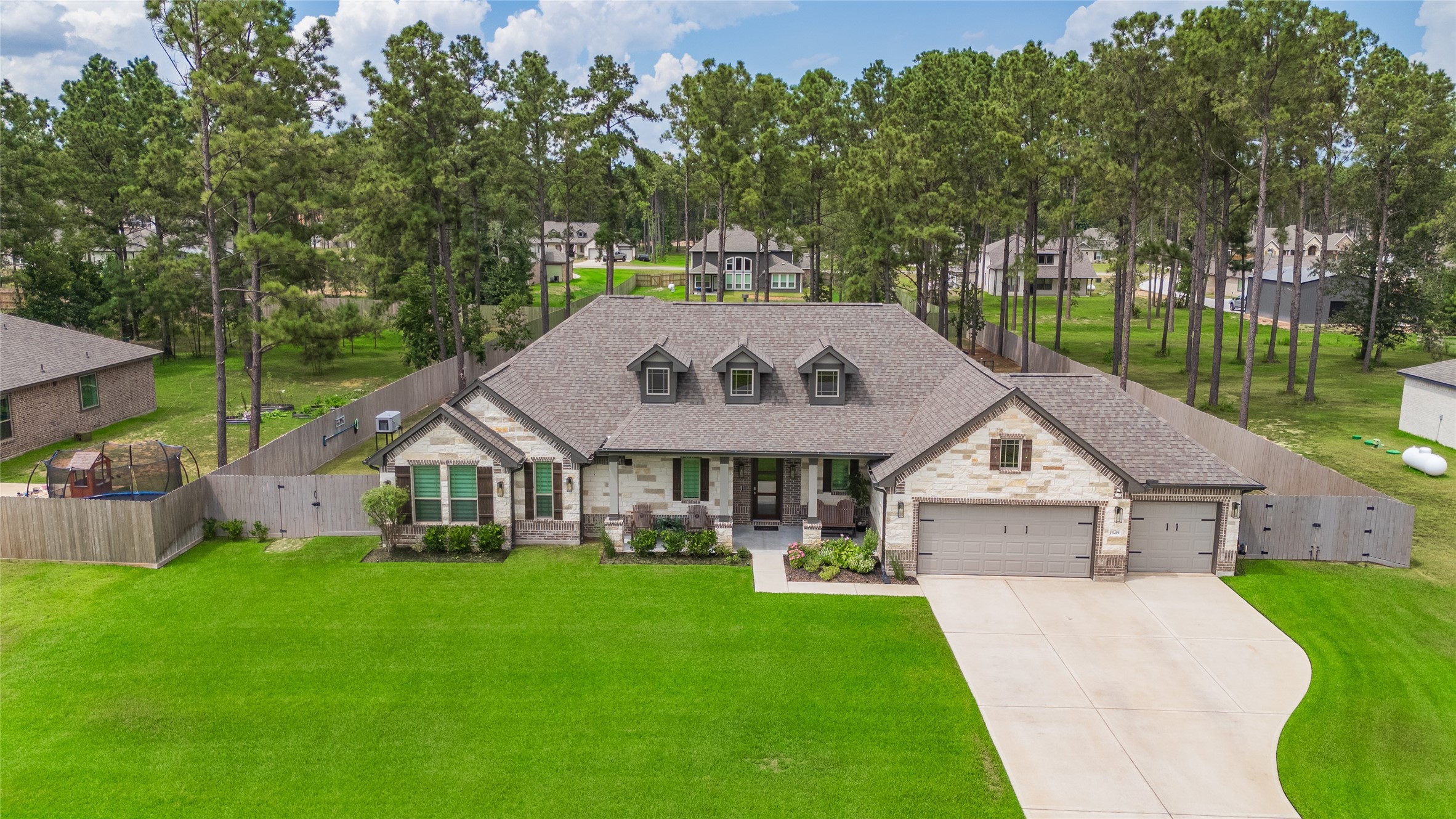 13419 Maverick Trail Road Conroe, TX 77303 - Photo 1 of 49 Welcome to Deer Pines with luxury homes on oversized lots with mature trees.