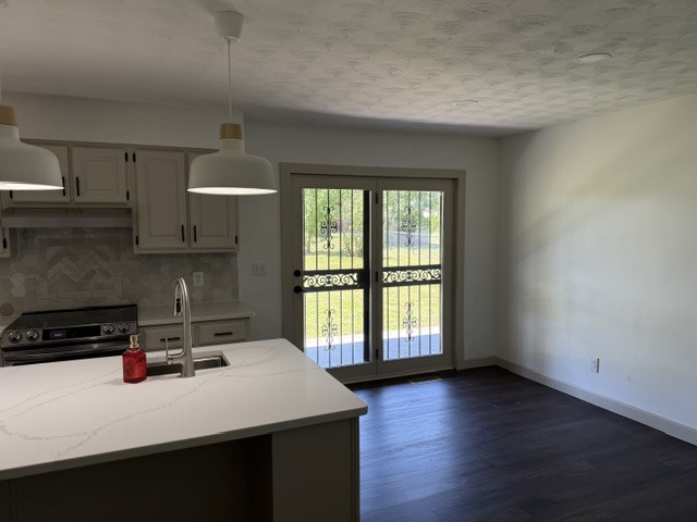 6241 Wards Mill Road Marion, IL 62959 - Photo 6 of 29 a kitchen with a sink a window and cabinets