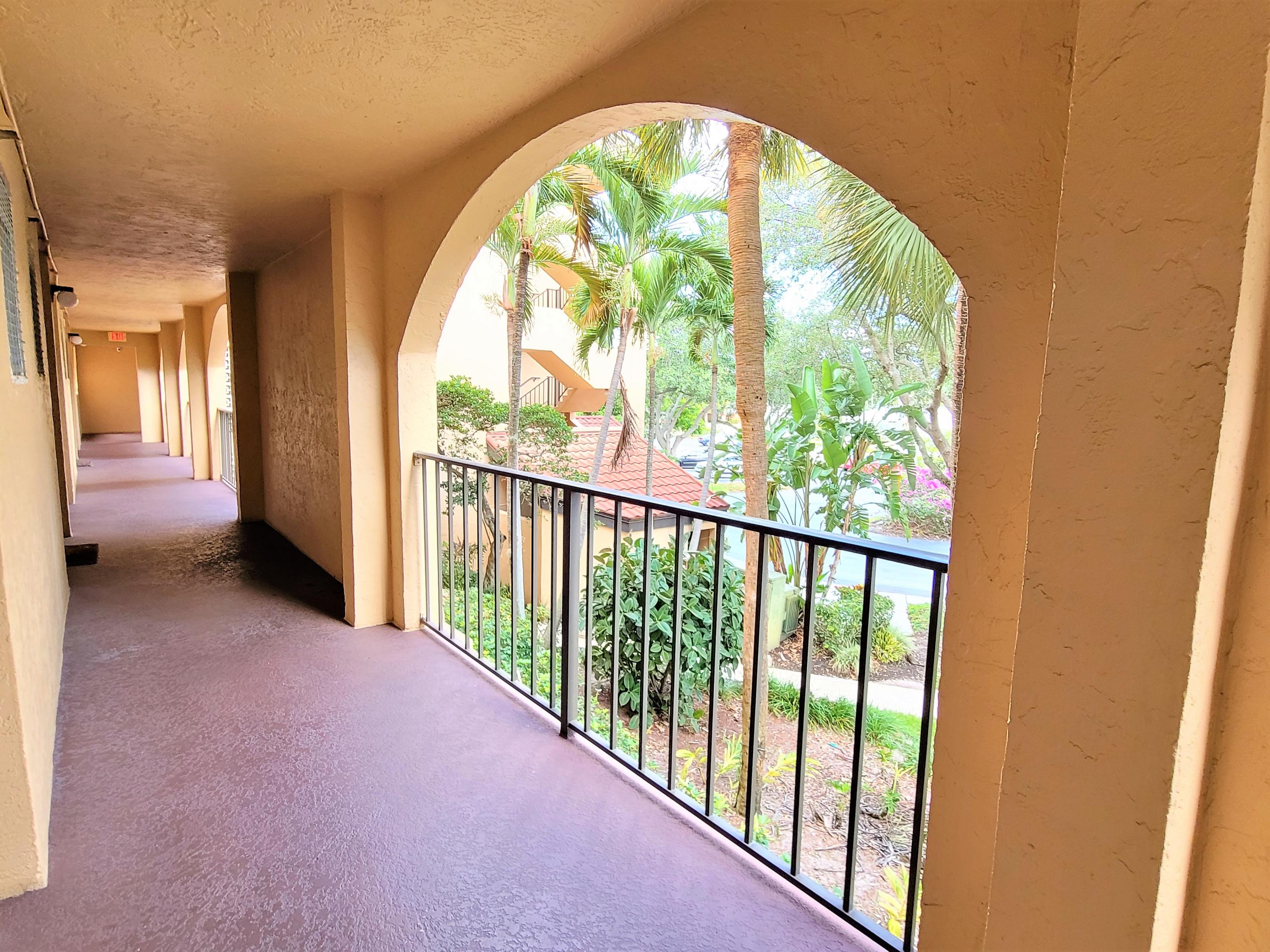 755 Dotterel Road, Unit 1209 Delray Beach, FL 33444 - Photo 19 of 28 Exterior Front Walkway