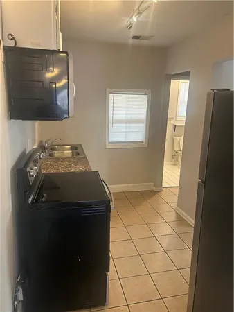 a bathroom with a sink a vanity and a mirror