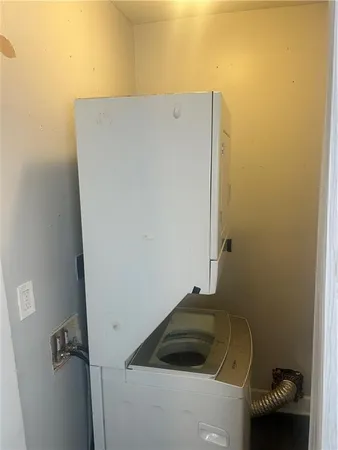 a room with a dryer and washer