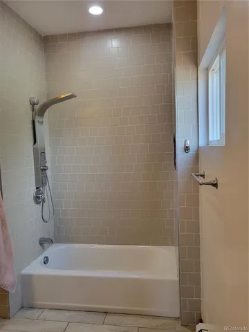 a bathroom with a bathtub