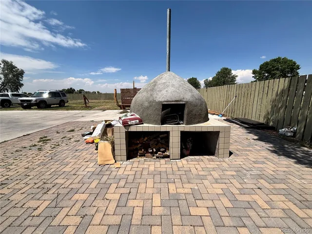 a view of a terrace with furniture