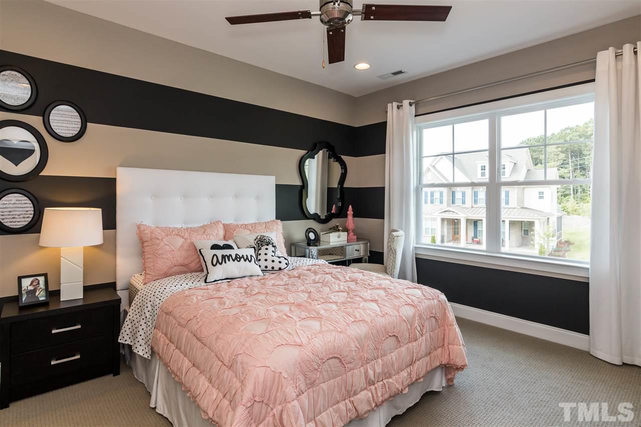 520 Belle Gate Place Cary, NC 27519 - Photo 23 of 25 a bedroom with a large bed and a window