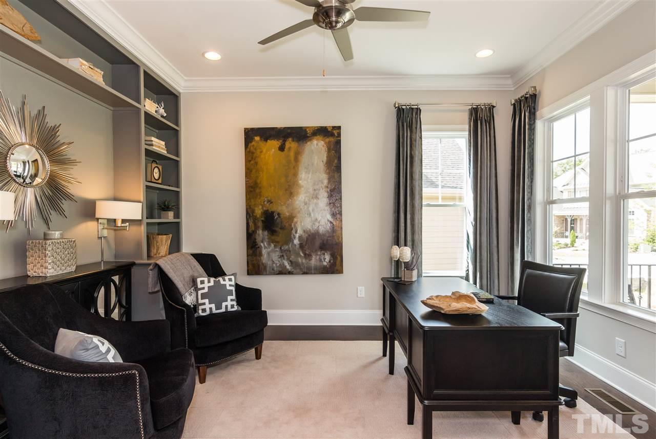 520 Belle Gate Place Cary, NC 27519 - Photo 6 of 25 a living room with furniture and a window