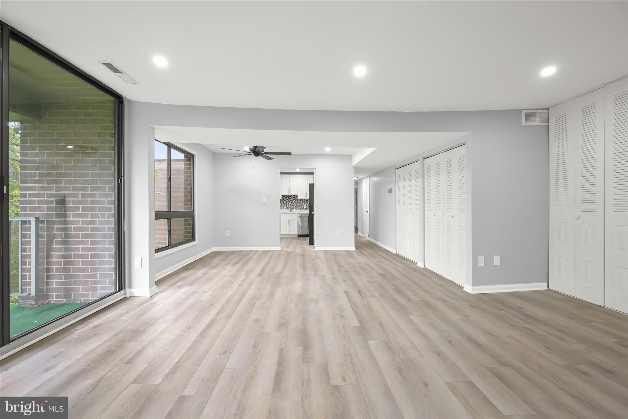 7967 Riggs Road, Unit 796710 Hyattsville, MD 20783 - Photo 9 of 29 Living - Dining - Balcony