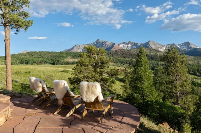 a view of a terrace with sitting area