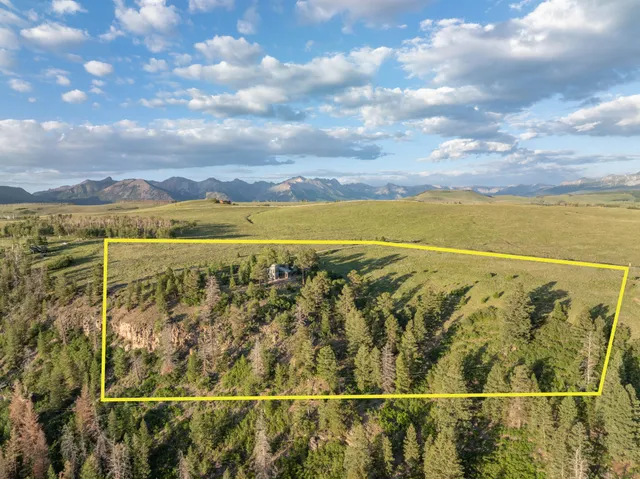 a view of an ocean and a mountain