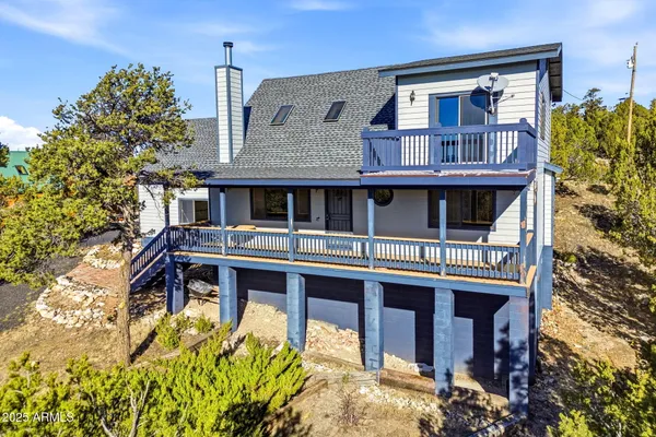 front view of a house with a balcony