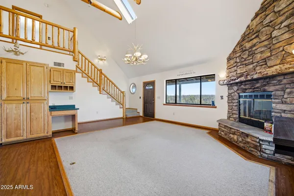 a kitchen with stainless steel appliances kitchen island a refrigerator and a stove