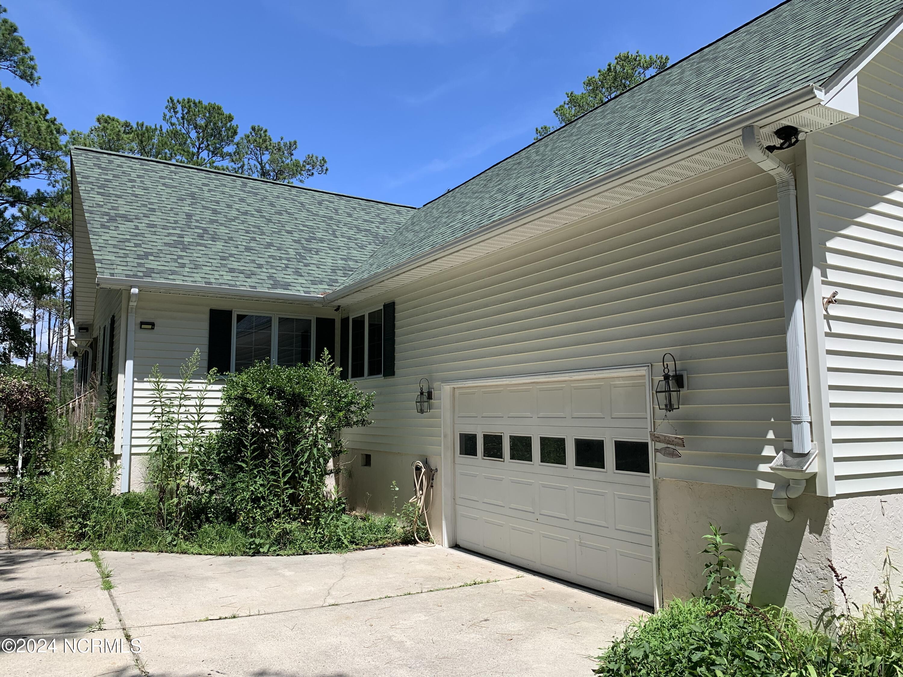 2829 Florence Road Merritt, NC 28556 - Photo 14 of 38 2 car garage