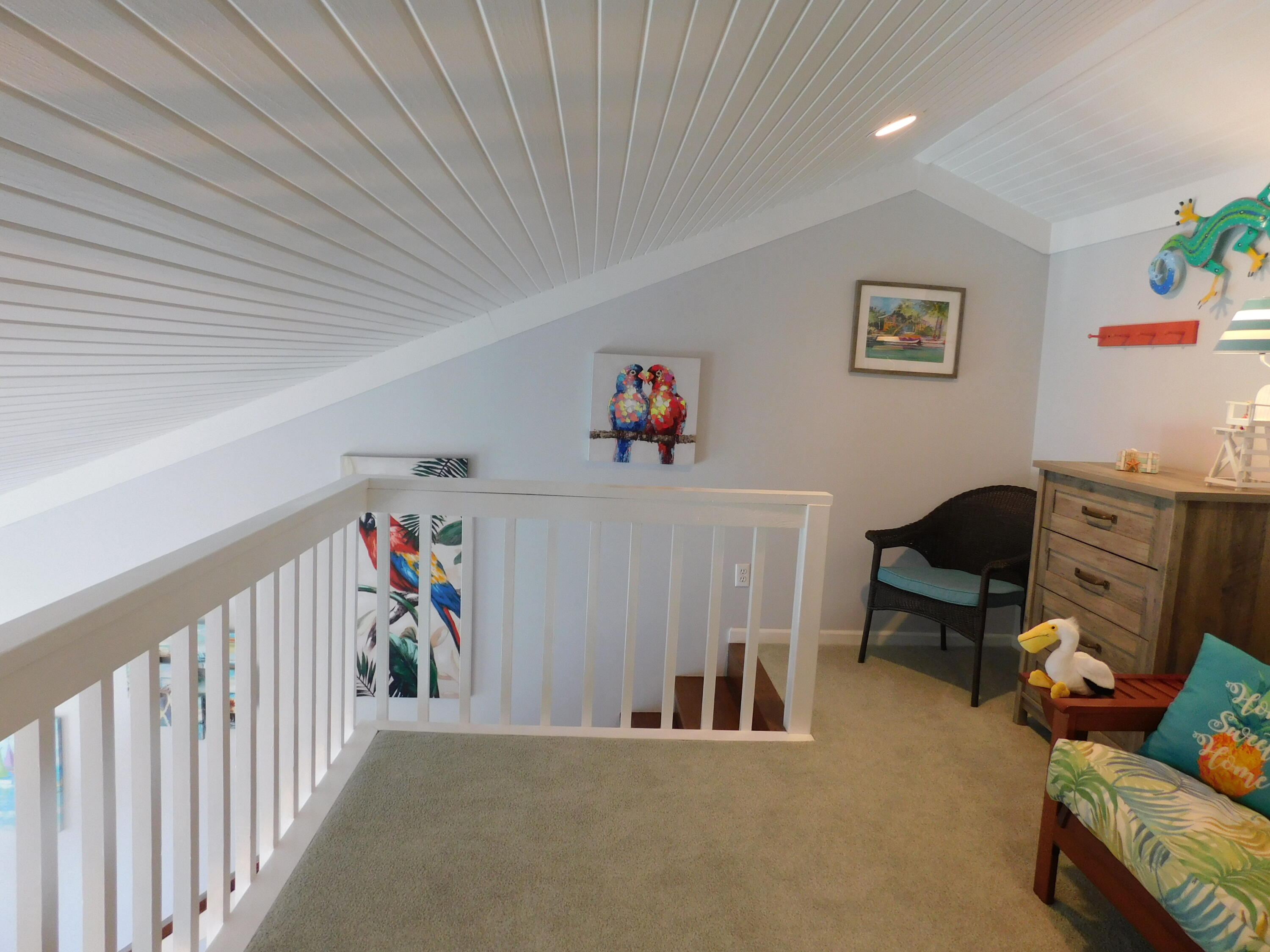4984 West County Highway 30A, Unit 5B Santa Rosa Beach, FL 32459 - Photo 15 of 46 a living room with furniture and a baby crib