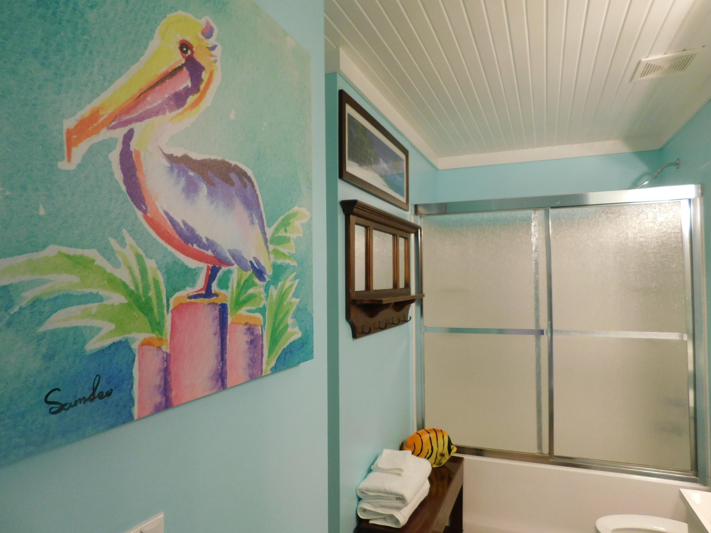 4984 West County Highway 30A, Unit 5B Santa Rosa Beach, FL 32459 - Photo 22 of 46 a bathroom with a mirror and a shower