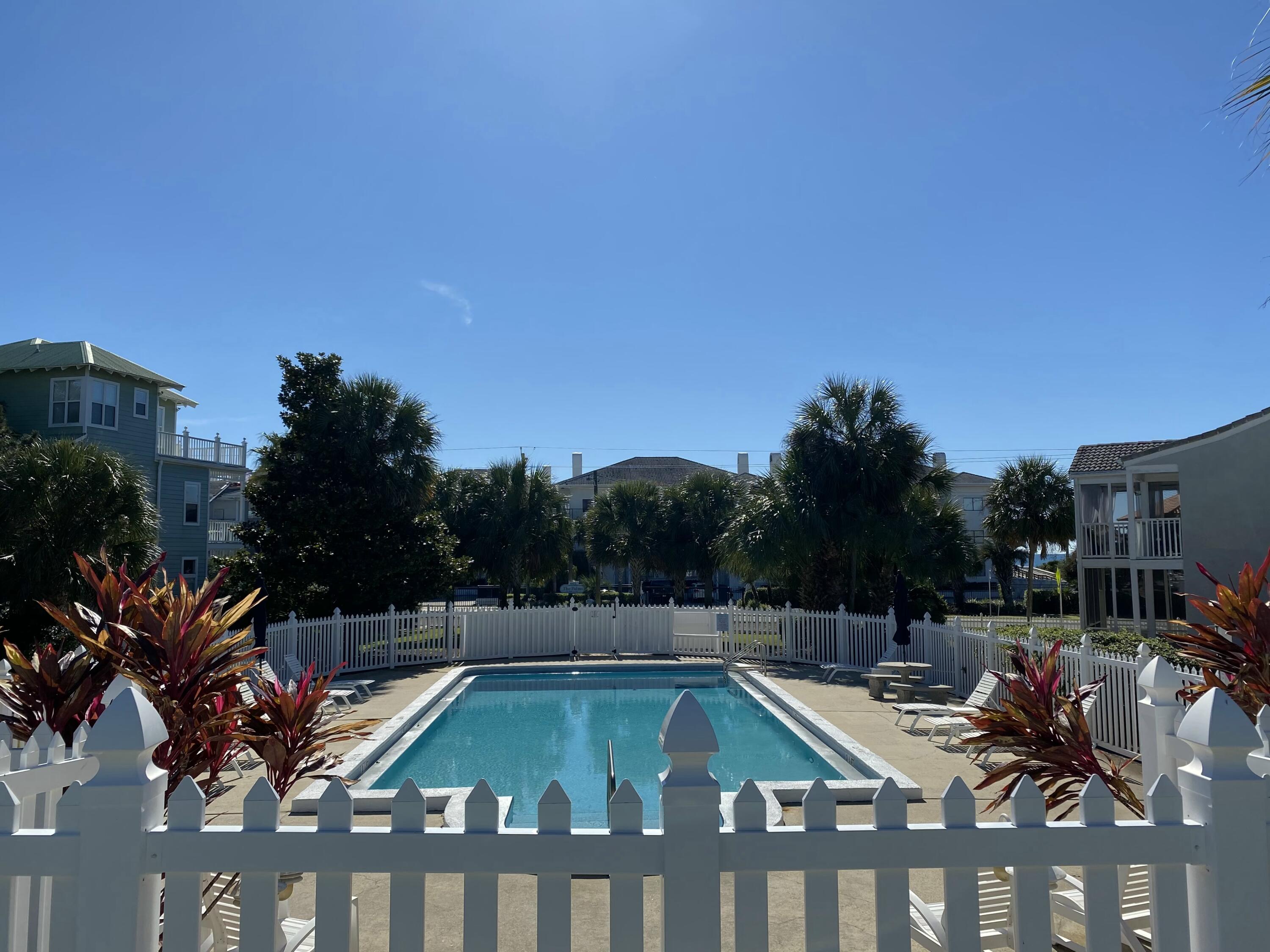 4984 West County Highway 30A, Unit 5B Santa Rosa Beach, FL 32459 - Photo 30 of 46 a view of swimming pool with chairs