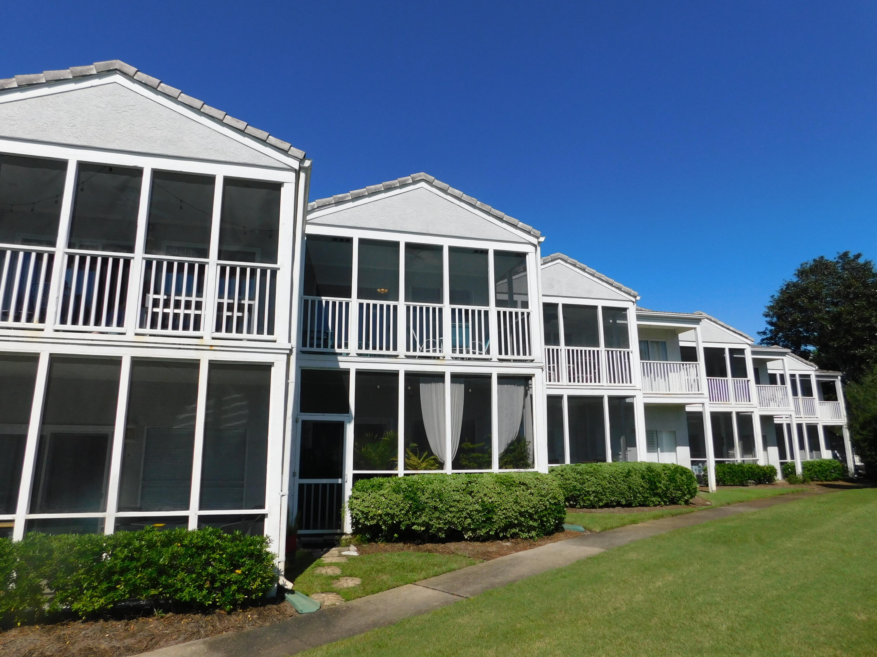 4984 West County Highway 30A, Unit 5B Santa Rosa Beach, FL 32459 - Photo 4 of 46 a view of a yard in front of a house