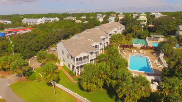 4984 West County Highway 30A, Unit 5B Santa Rosa Beach, FL 32459 - Photo 45 of 46 an aerial view of residential houses with outdoor space and trees