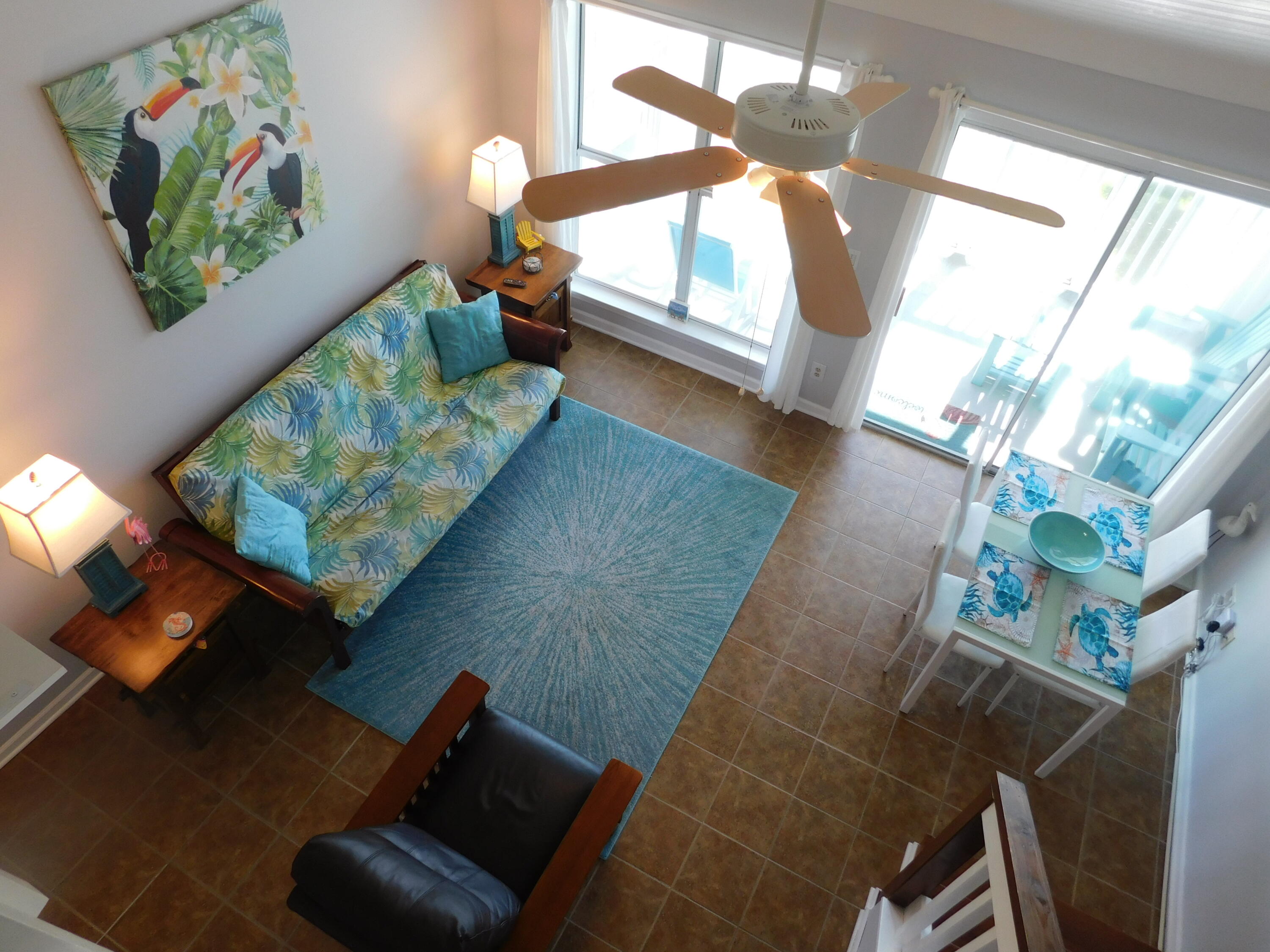 4984 West County Highway 30A, Unit 5B Santa Rosa Beach, FL 32459 - Photo 8 of 46 a living room with furniture and a window