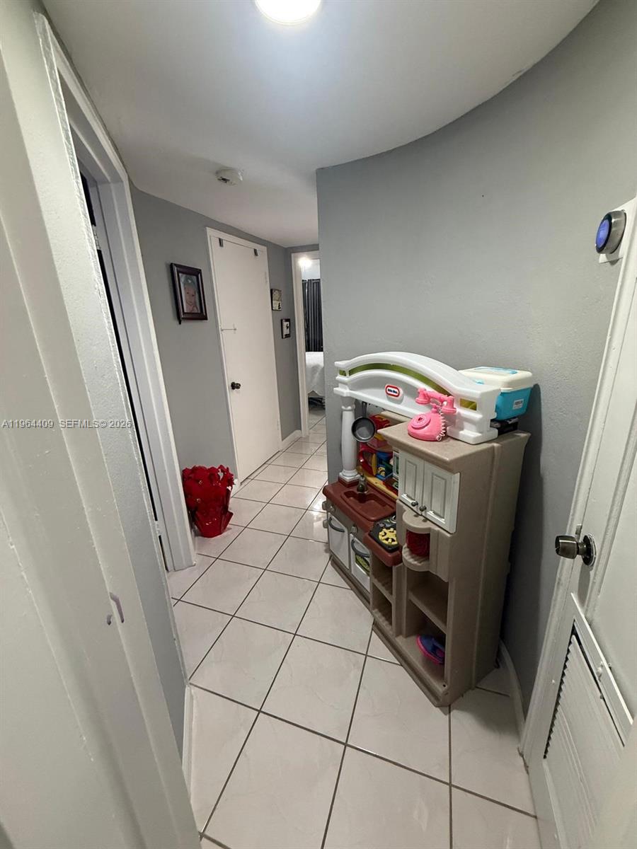 3411 Southwest 11th Street, Unit 3B Miami, FL 33135 - Photo 11 of 14 a utility room with dryer and washer