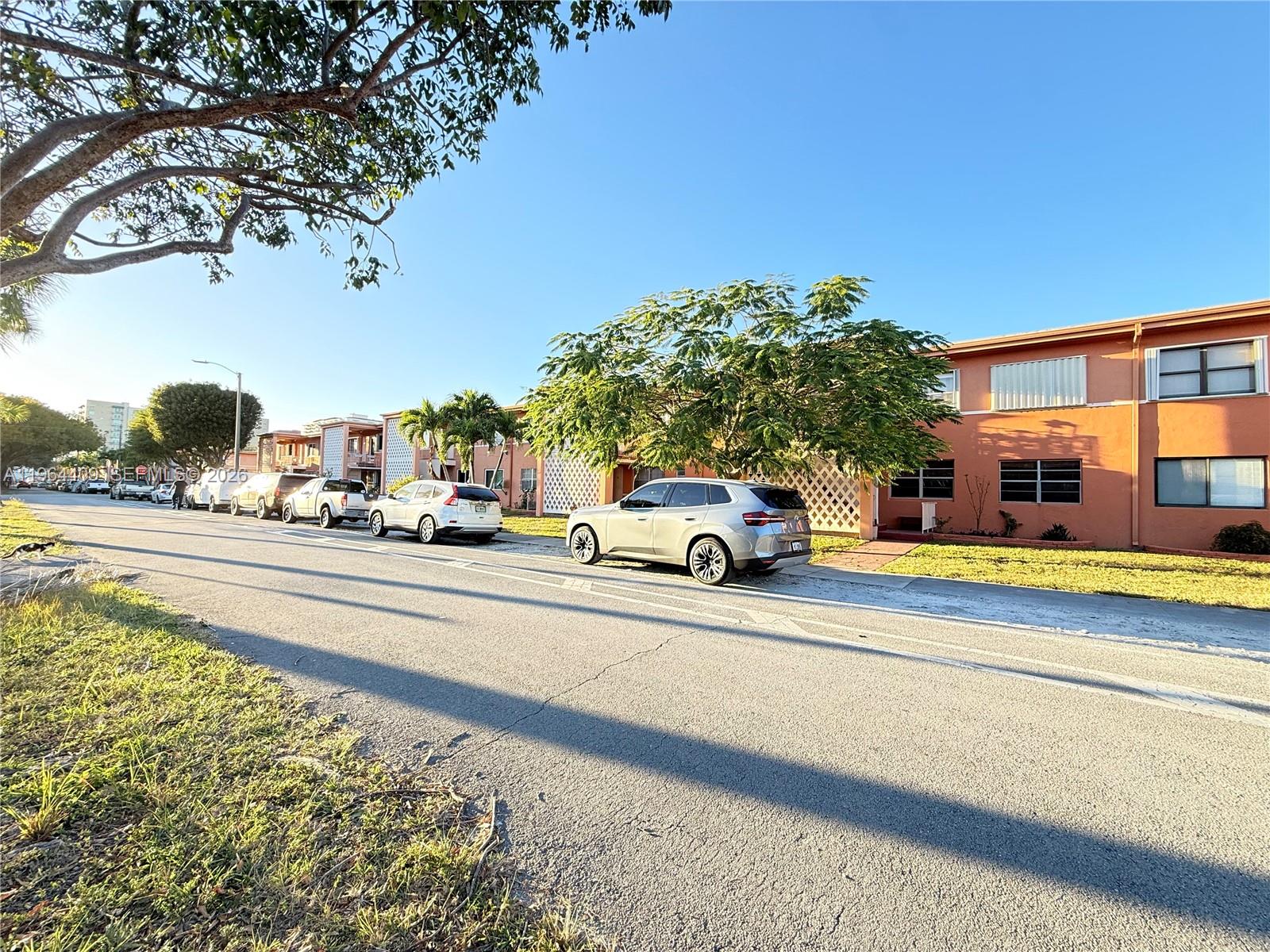3411 Southwest 11th Street, Unit 3B Miami, FL 33135 - Photo 4 of 14 a view of a car parked on the side of a street