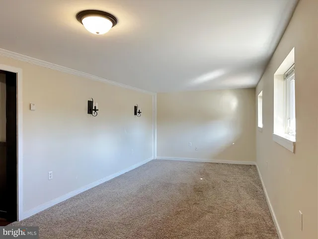 a view of a livingroom with a fireplace
