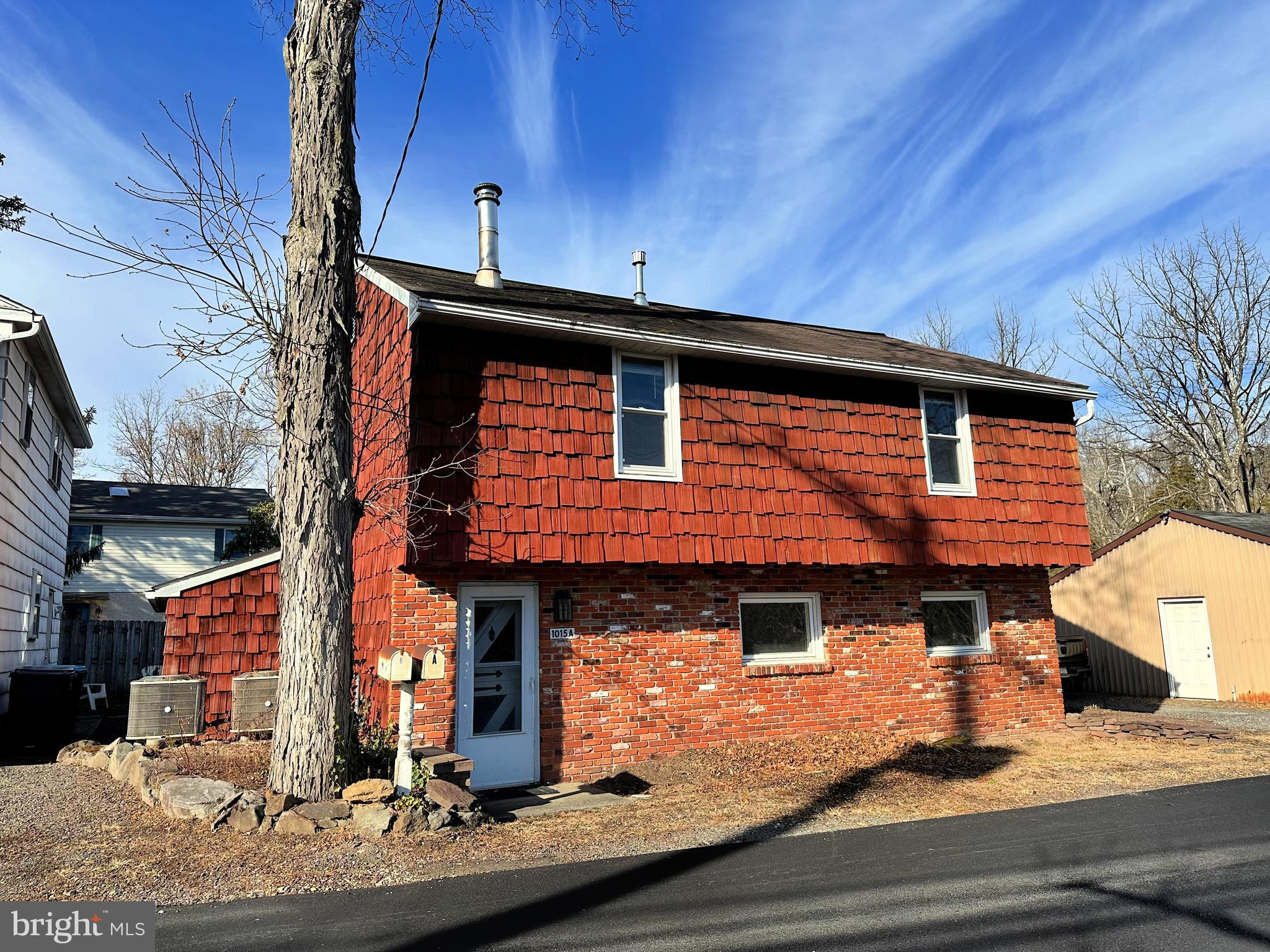 1015 A Magazine Road Green Lane, PA 18054 - Photo 2 of 26 a front view of a house with entertaining space