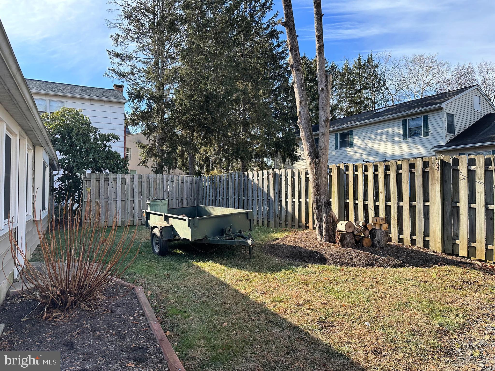1015 A Magazine Road Green Lane, PA 18054 - Photo 5 of 26 a view of a deck with a chairs and a fence