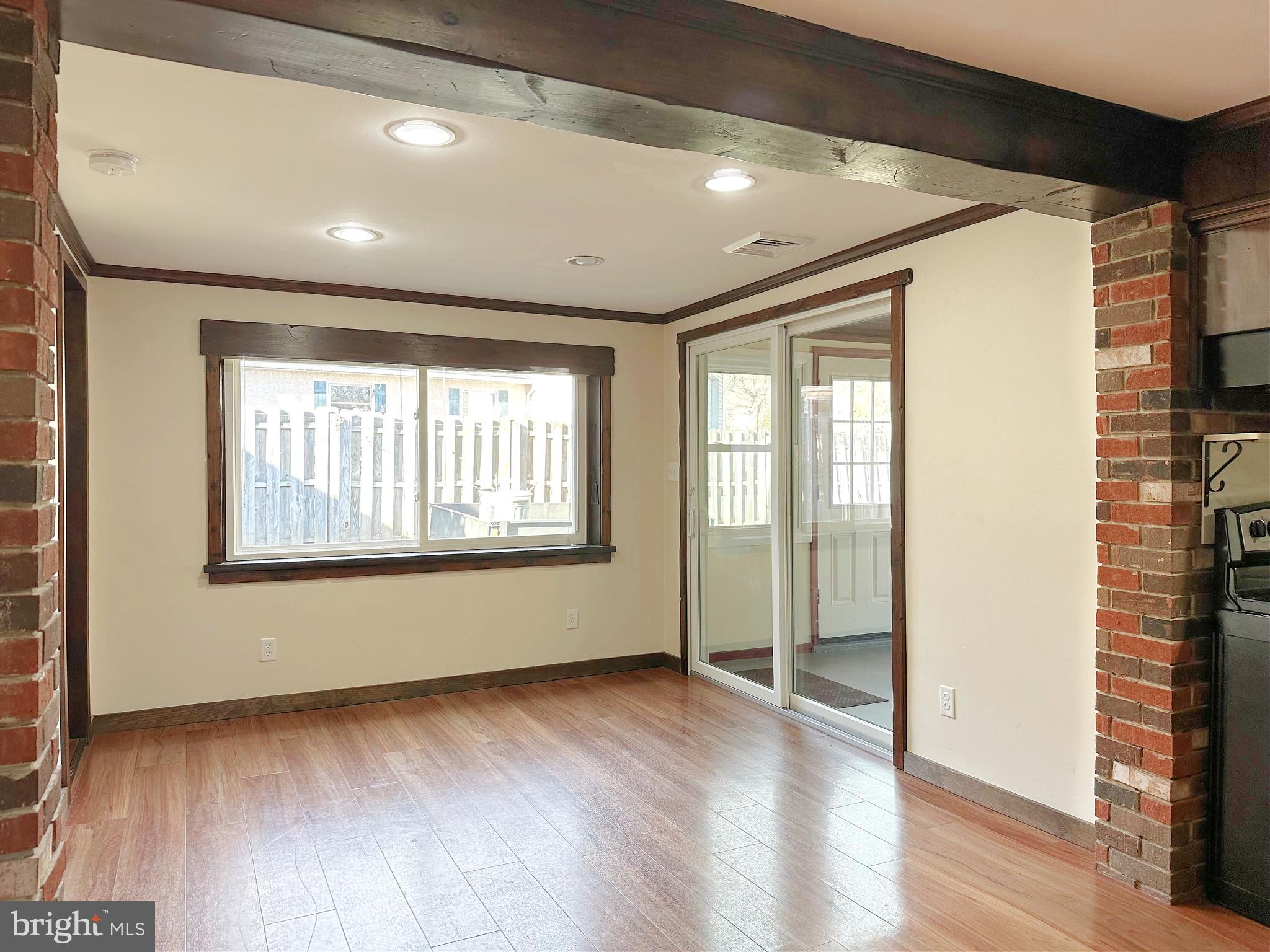 1015 A Magazine Road Green Lane, PA 18054 - Photo 8 of 26 a view of an empty room with wooden floor and a window