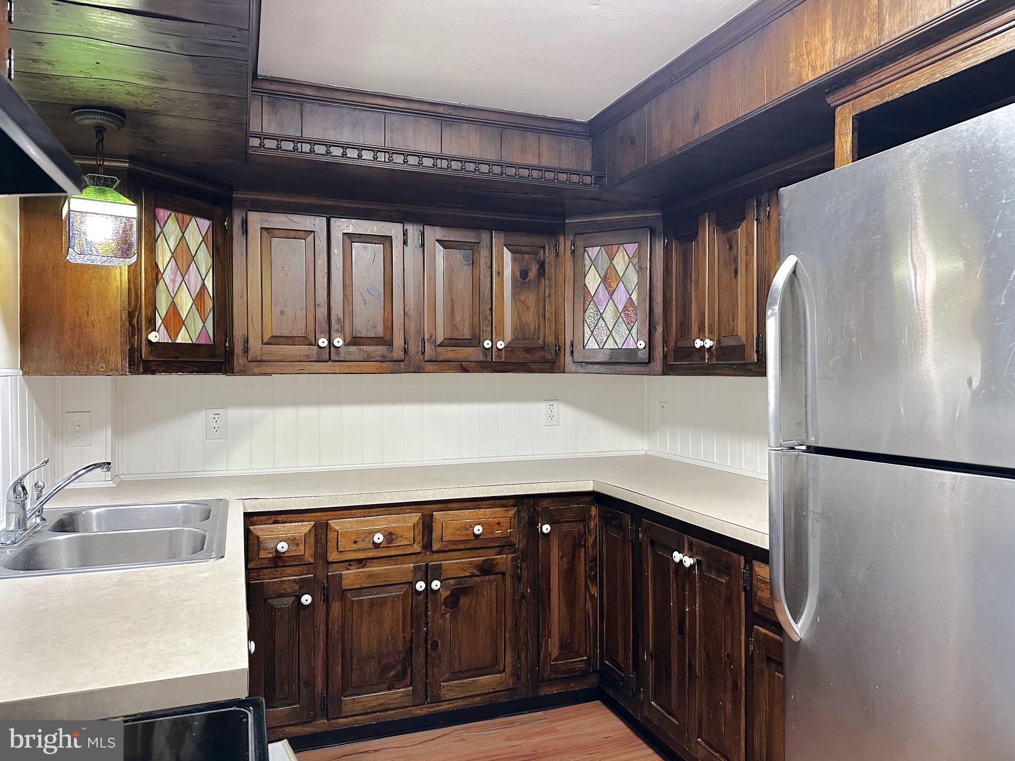 1015 A Magazine Road Green Lane, PA 18054 - Photo 10 of 26 a kitchen with a refrigerator and a sink
