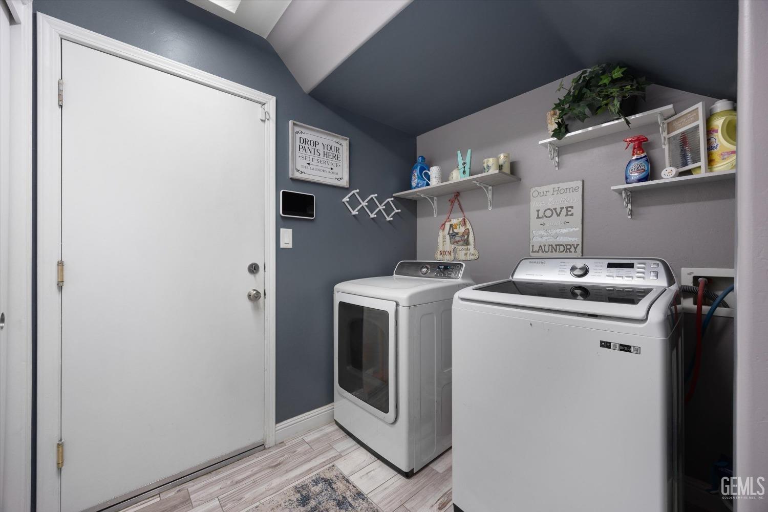 Undisclosed Address Bakersfield, CA 93312 - Photo 33 of 47 a utility room with dryer and washer