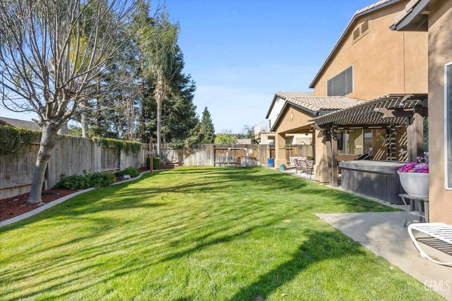 Undisclosed Address Bakersfield, CA 93312 - Photo 37 of 47 a view of a house with backyard and sitting area