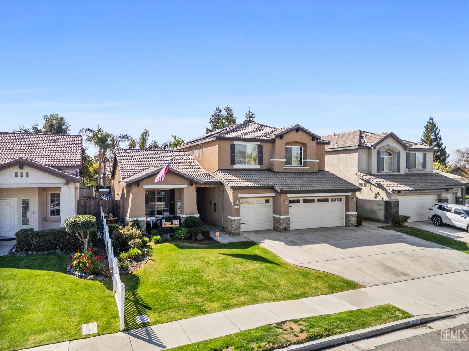 Undisclosed Address Bakersfield, CA 93312 - Photo 44 of 47 a front view of a house with garden