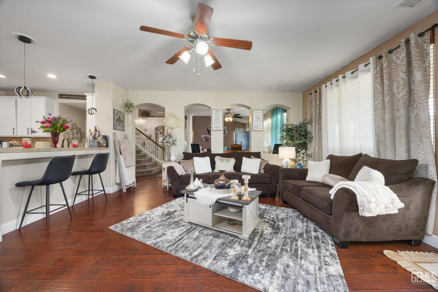 Undisclosed Address Bakersfield, CA 93312 - Photo 8 of 47 a living room with furniture and a large window