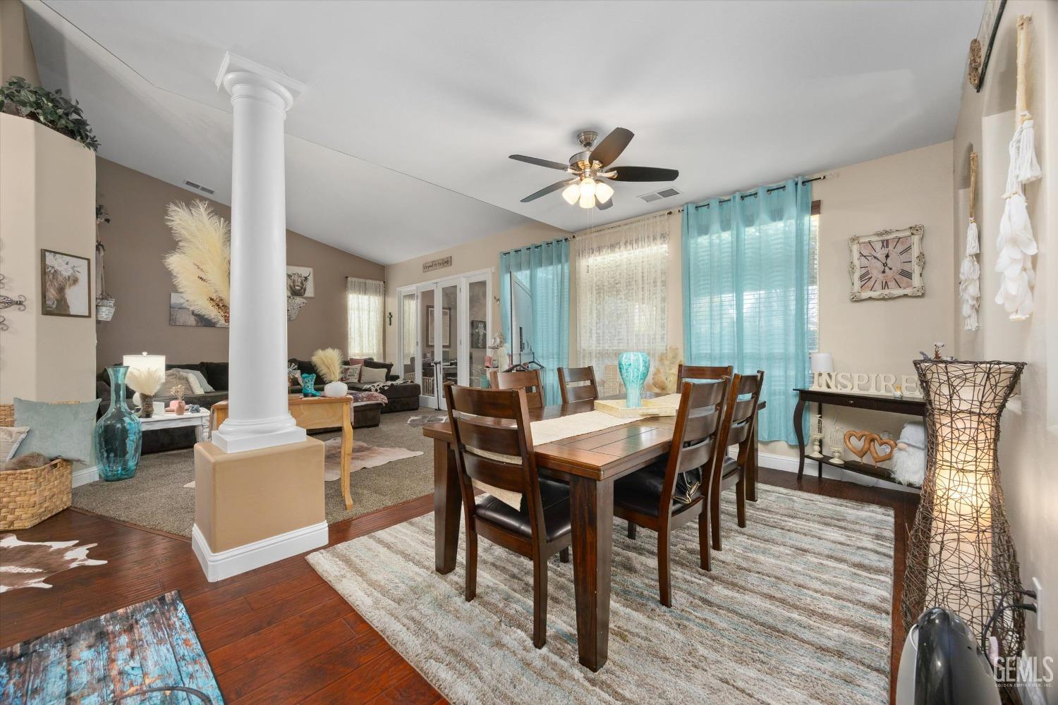 Undisclosed Address Bakersfield, CA 93312 - Photo 10 of 47 a view of a dining room with furniture window and wooden floor