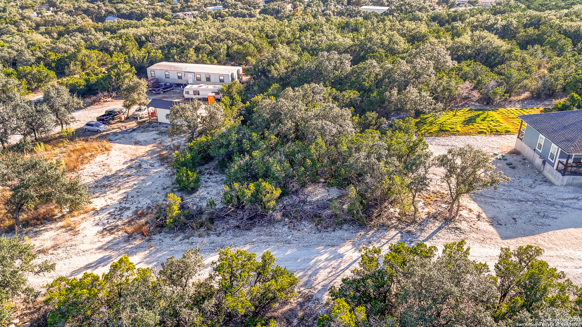 1044 Ken Wayne Drive Spring Branch, TX 78070 - Photo 11 of 12 a view of a house with a yard and sitting area