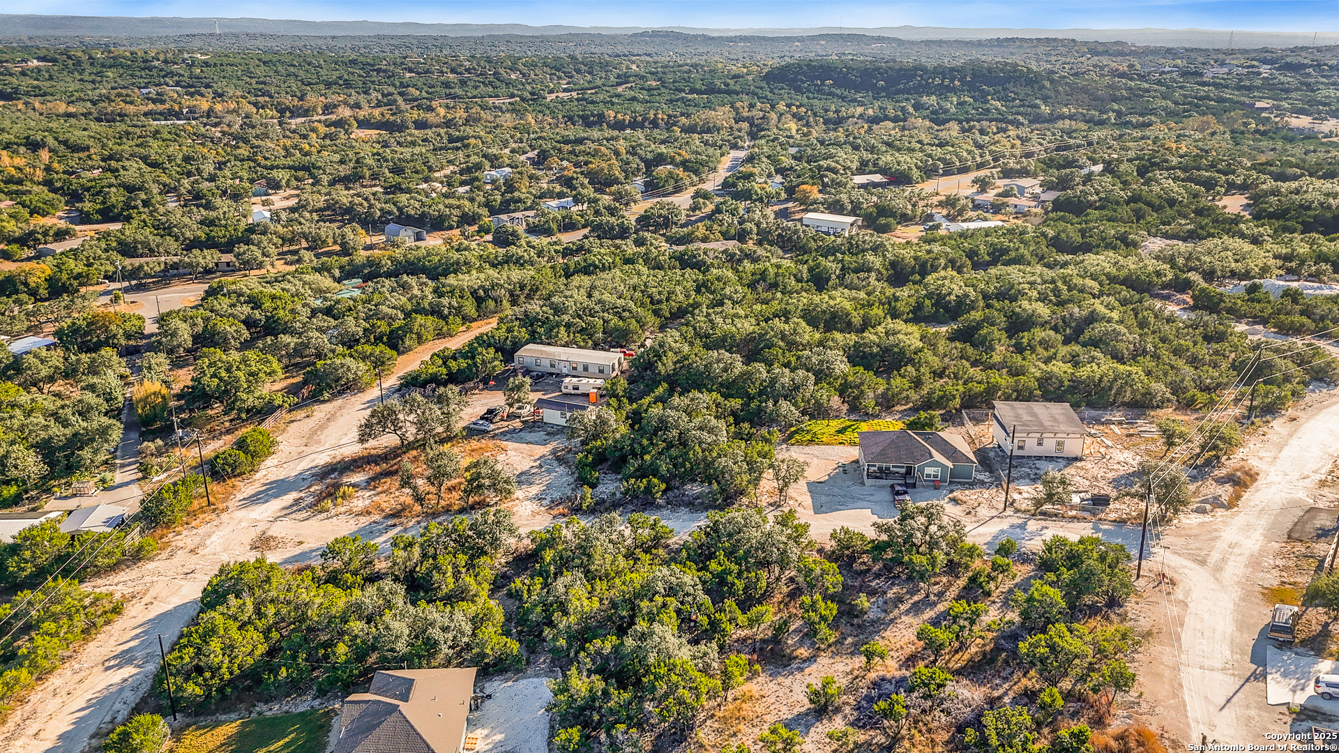 1044 Ken Wayne Drive Spring Branch, TX 78070 - Photo 5 of 12 an aerial view of residential house with parking space