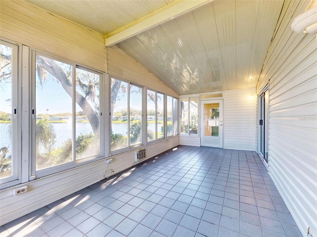 705 Starboard Avenue Edgewater, FL 32141 - Photo 32 of 52 a view of an empty room with a window