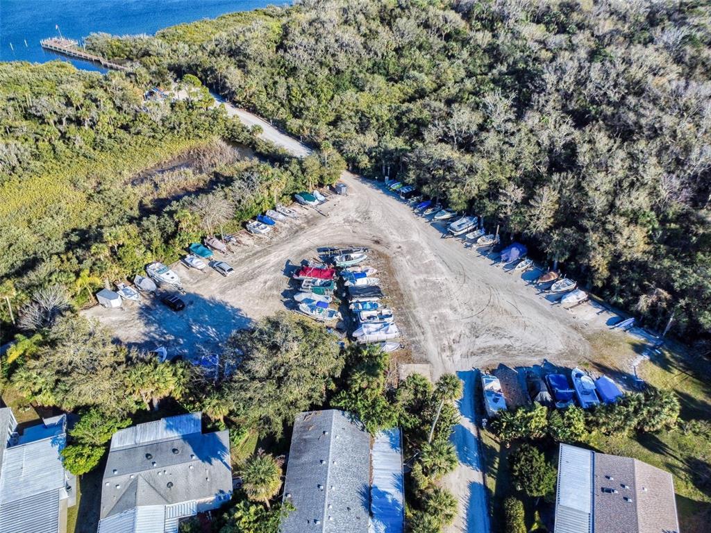 705 Starboard Avenue Edgewater, FL 32141 - Photo 43 of 52 an aerial view of a houses with yard