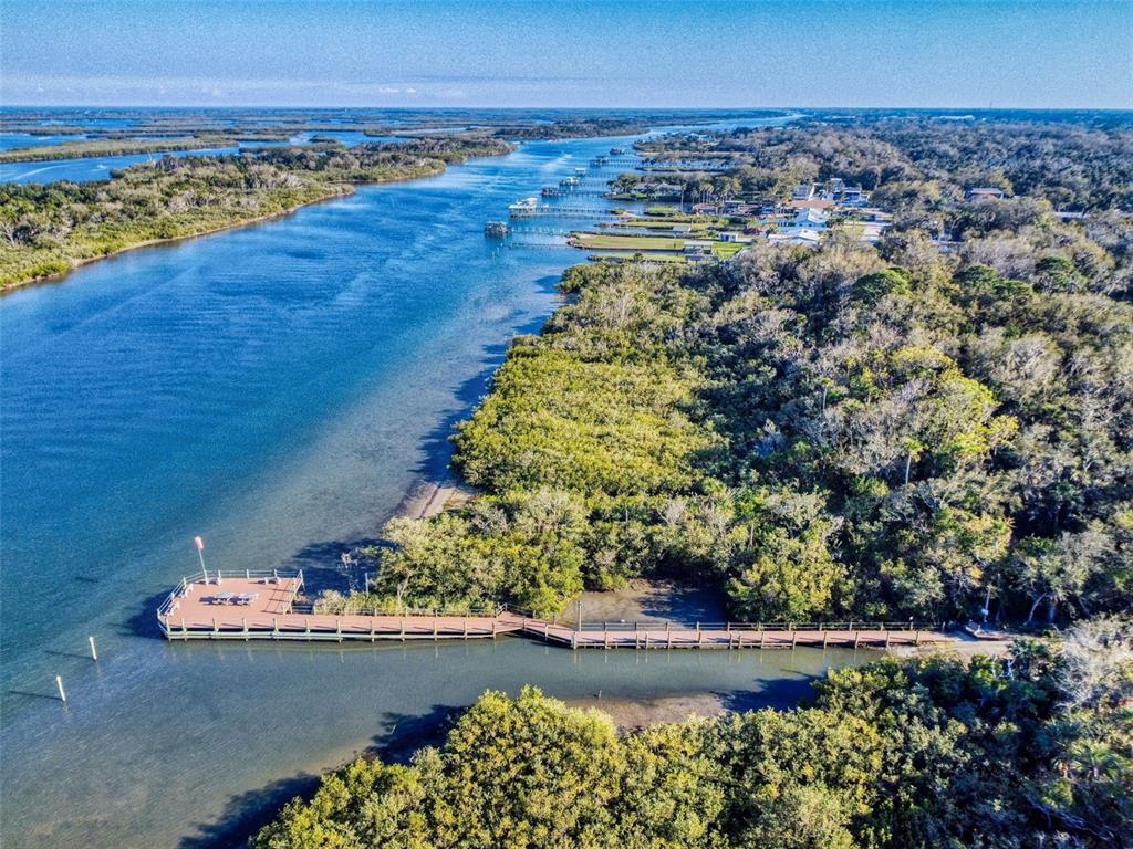 705 Starboard Avenue Edgewater, FL 32141 - Photo 46 of 52 view of a lake with a city