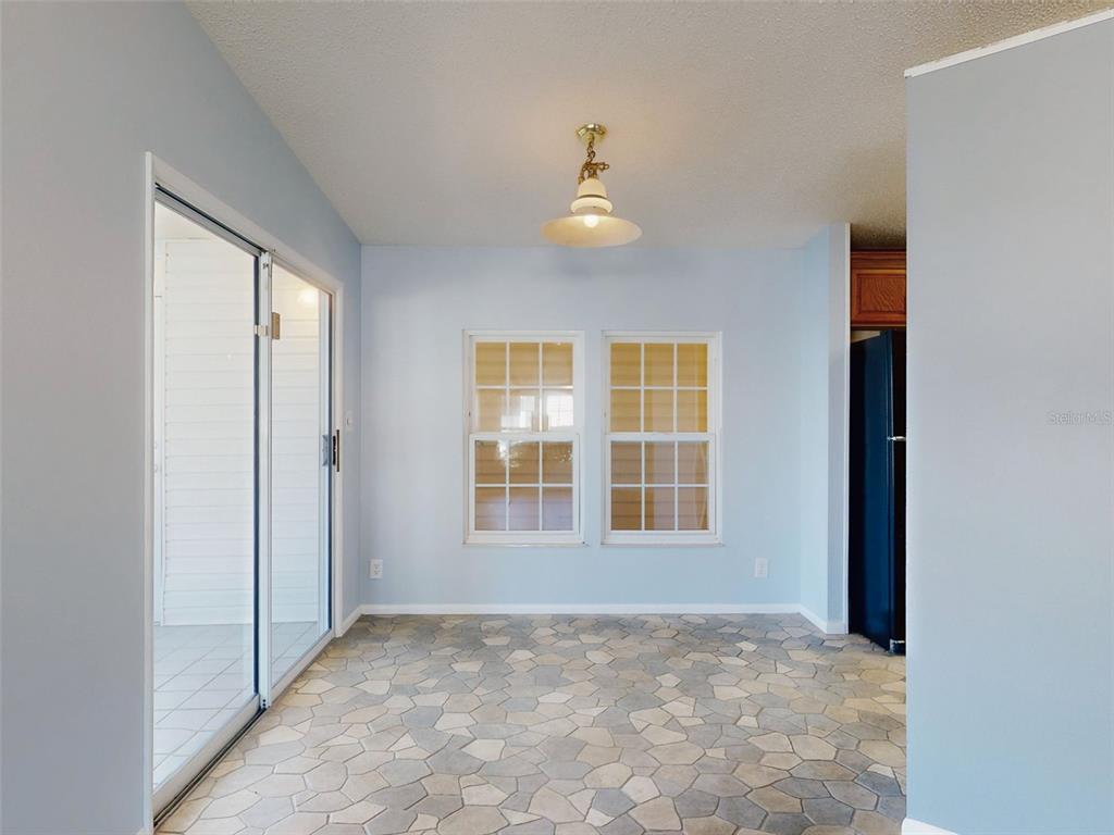 705 Starboard Avenue Edgewater, FL 32141 - Photo 8 of 52 a view of an empty room with a window