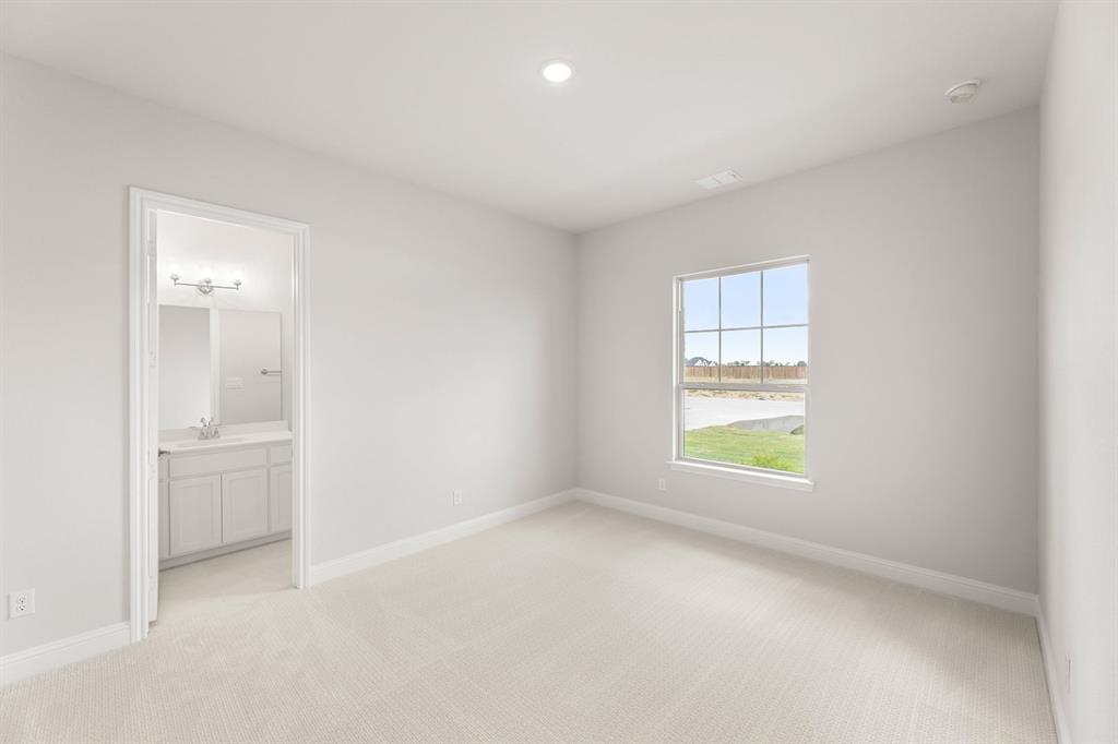132 Evanston Court Rhome, TX 76078 - Photo 32 of 40 132 Evanston-Bedroom-2