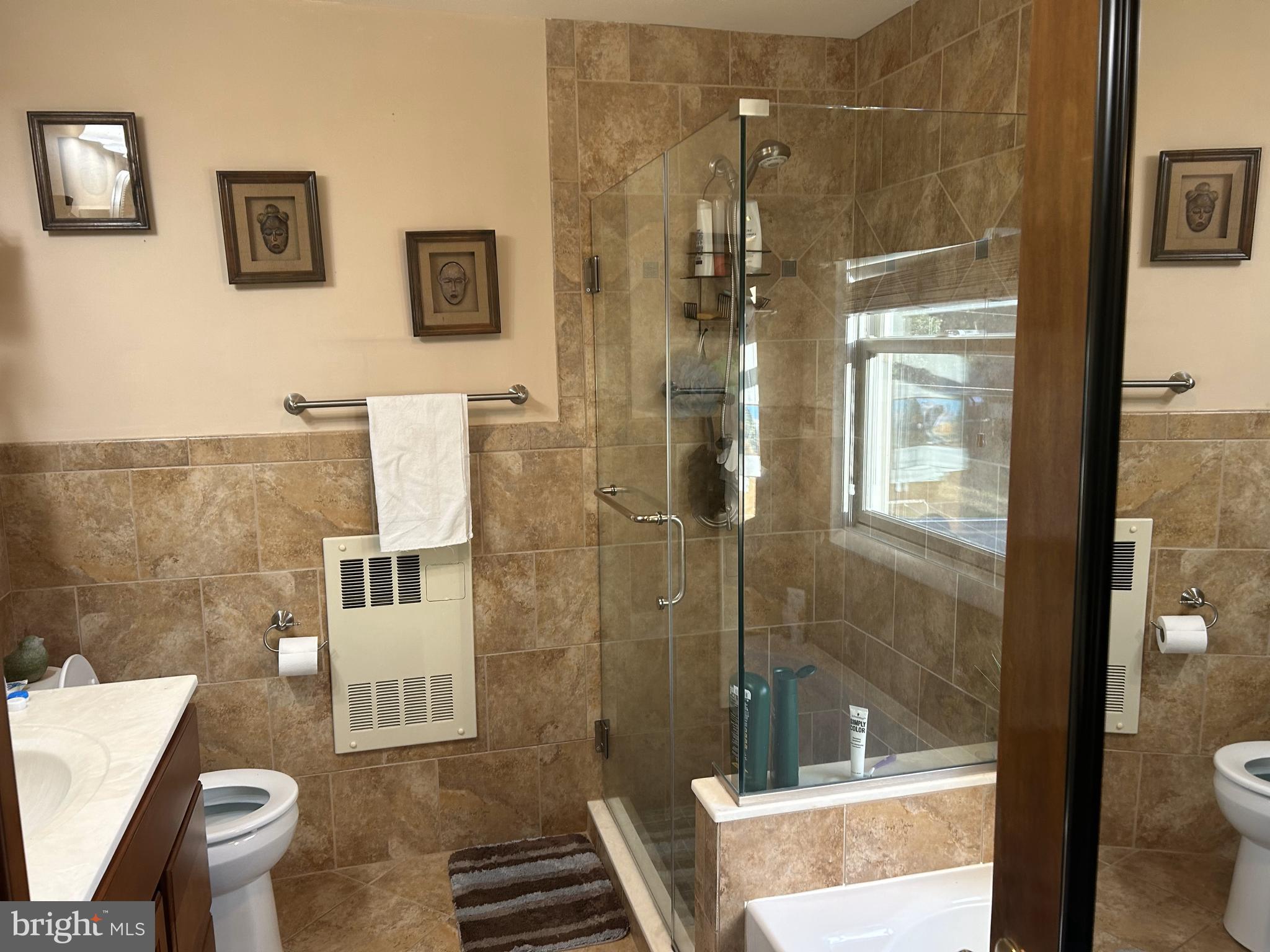 6423 Bikle Road Fayetteville, PA 17222 - Photo 19 of 56 a bathroom with a toilet and a shower