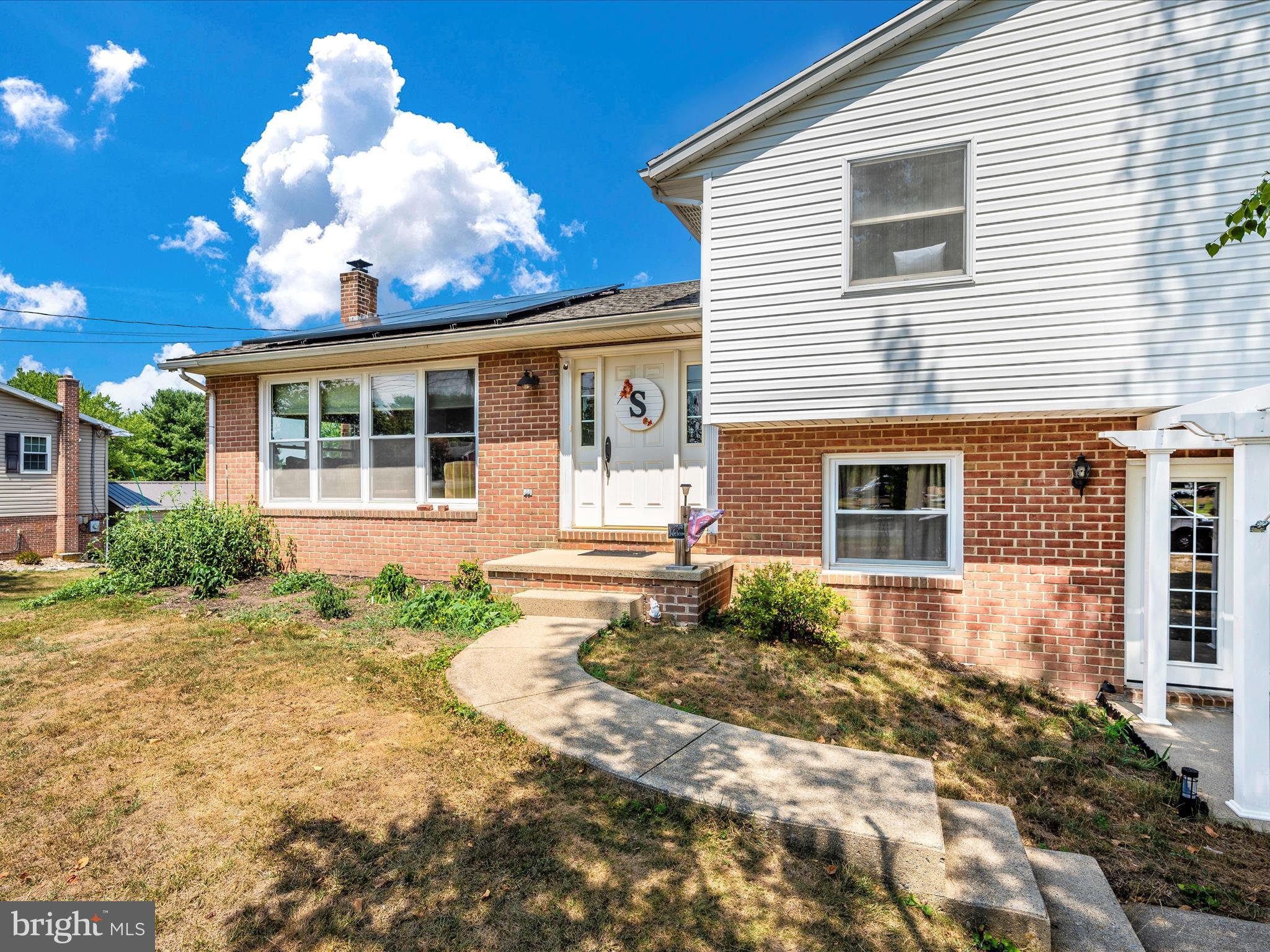 6423 Bikle Road Fayetteville, PA 17222 - Photo 2 of 56 a view of a house with a yard