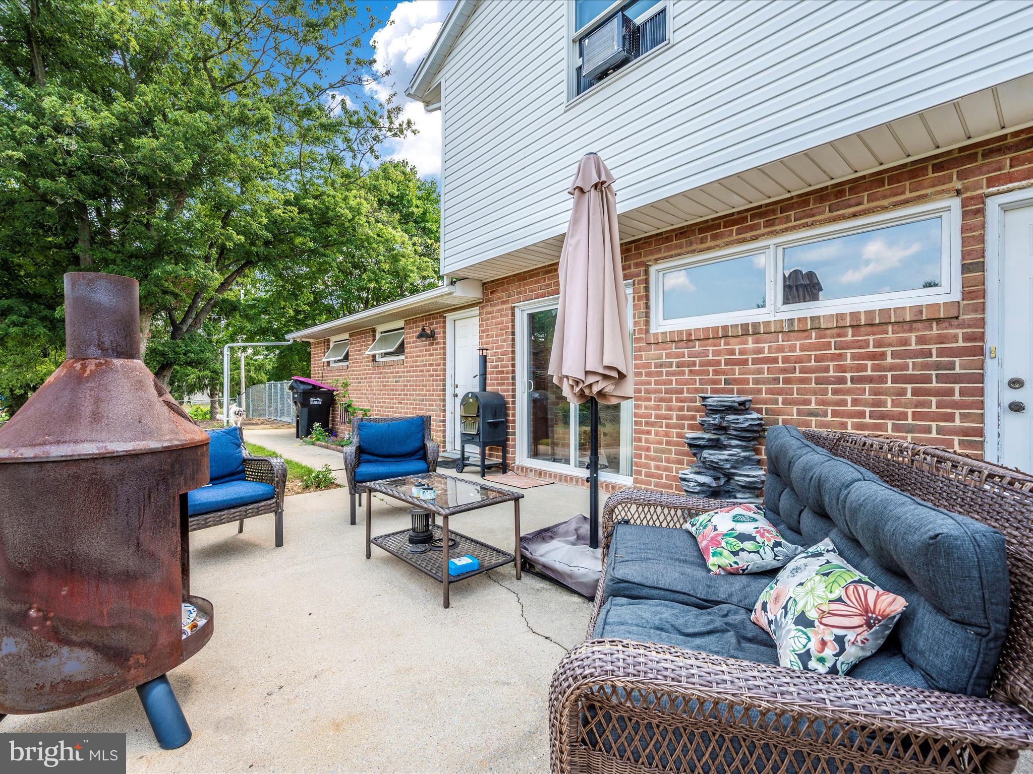 6423 Bikle Road Fayetteville, PA 17222 - Photo 43 of 56 a outdoor living space with furniture and a fireplace