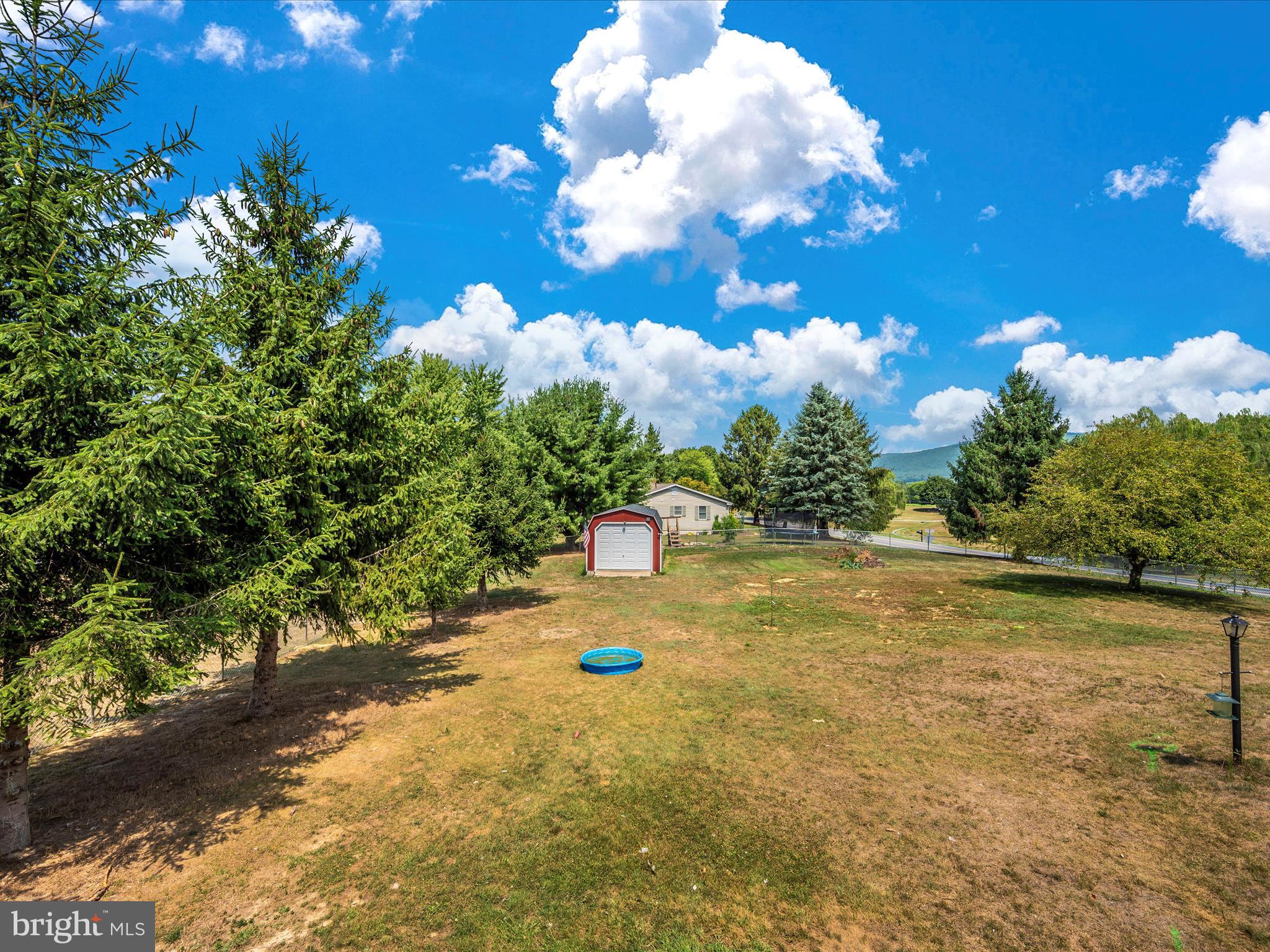 6423 Bikle Road Fayetteville, PA 17222 - Photo 52 of 56 a view of a yard with swimming pool
