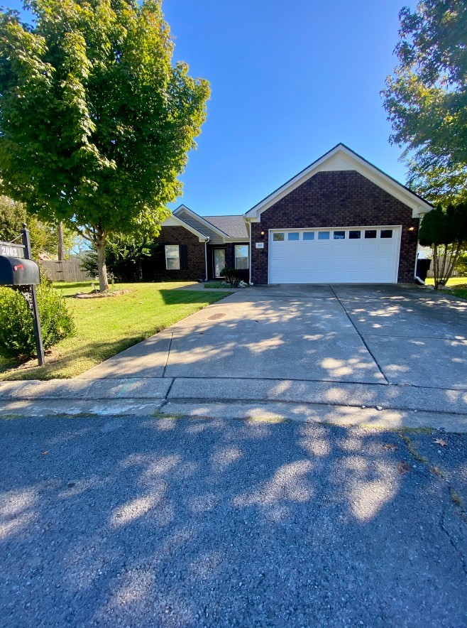 a house with swimming pool in front of it