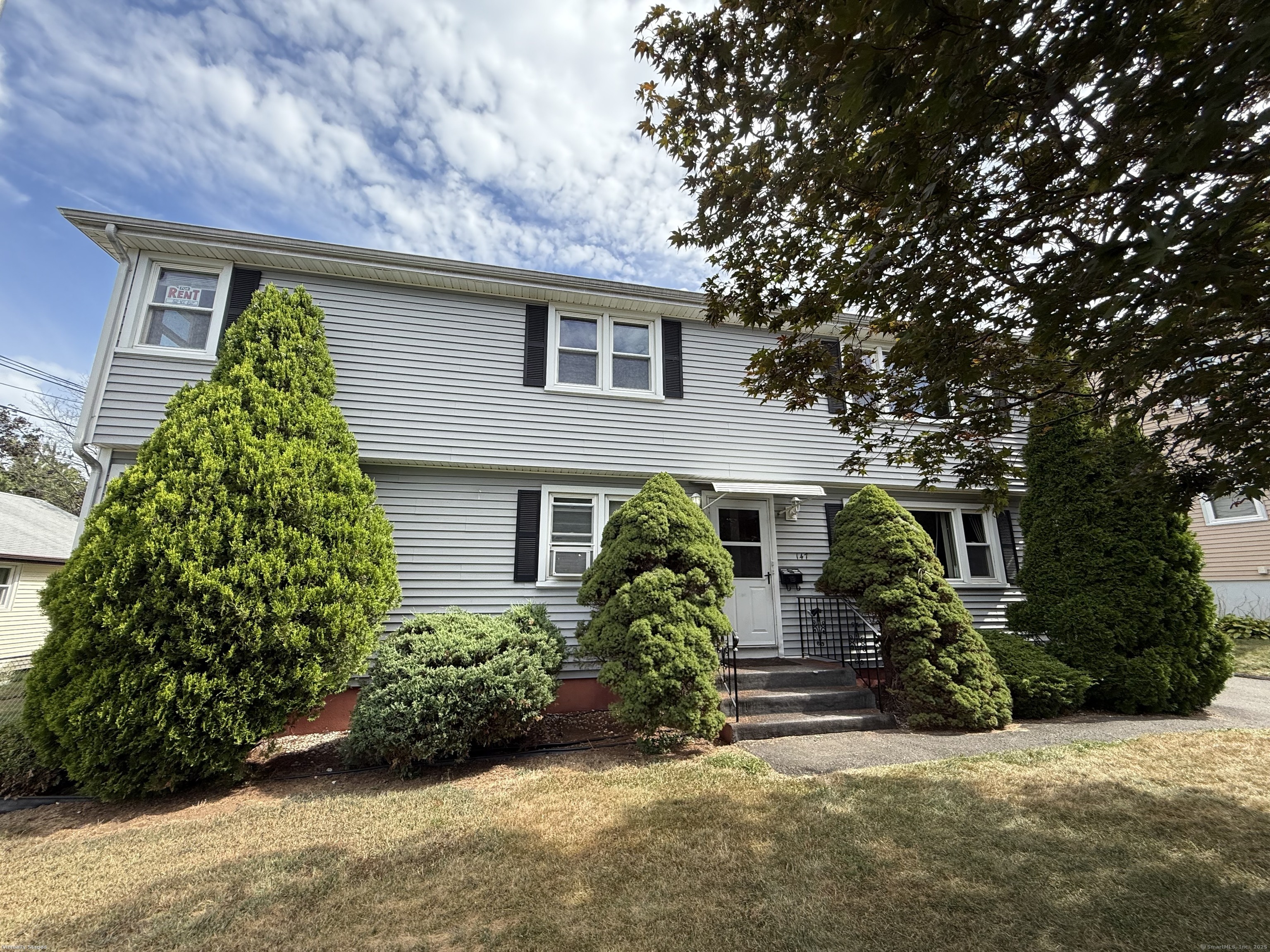 147 Overlook Avenue New Britain, CT 06053 - Photo 1 of 8 front view of house with potted plants and a yard