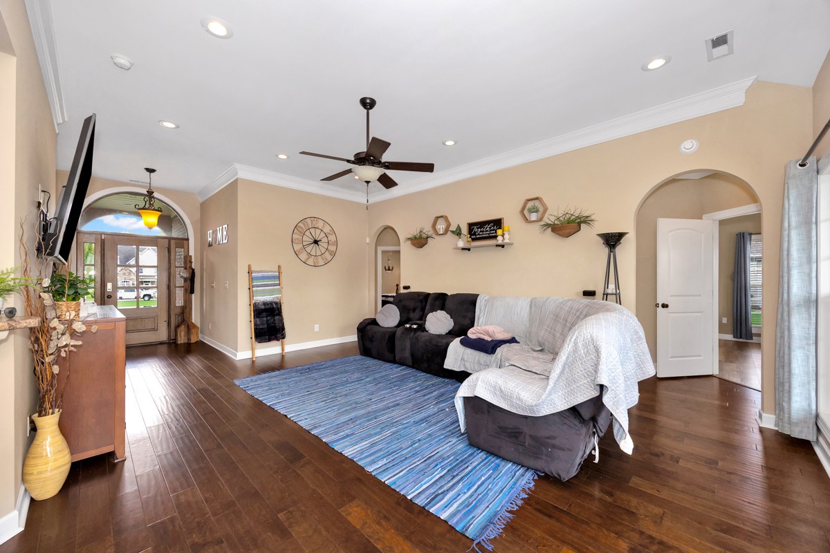 402 Vista Shores Road Rogersville, AL 35652 - Photo 11 of 55 a living room with furniture and wooden floor